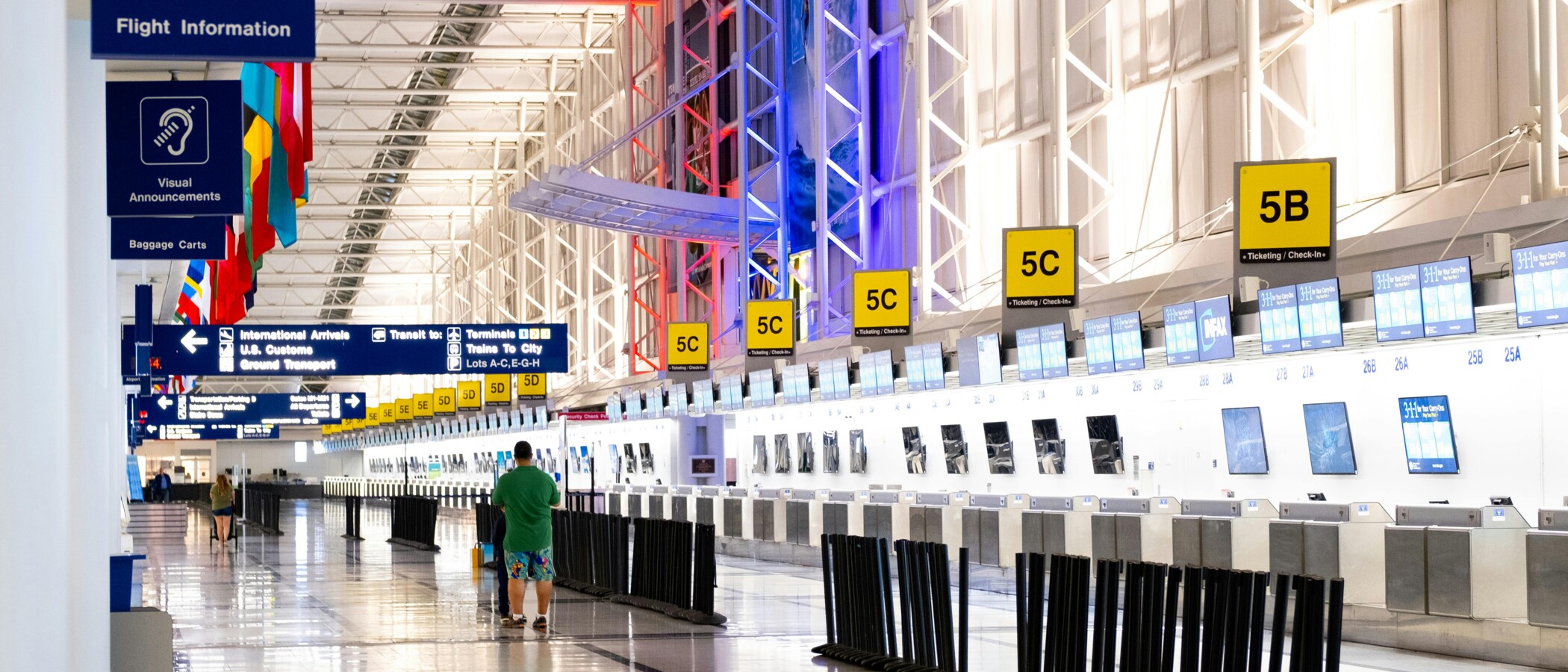 Airport check-in counters and signage