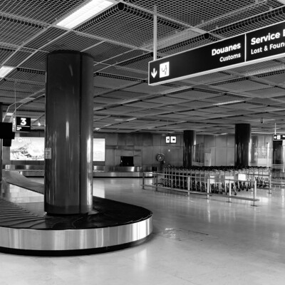 Baggage delivery carousel and airport signage